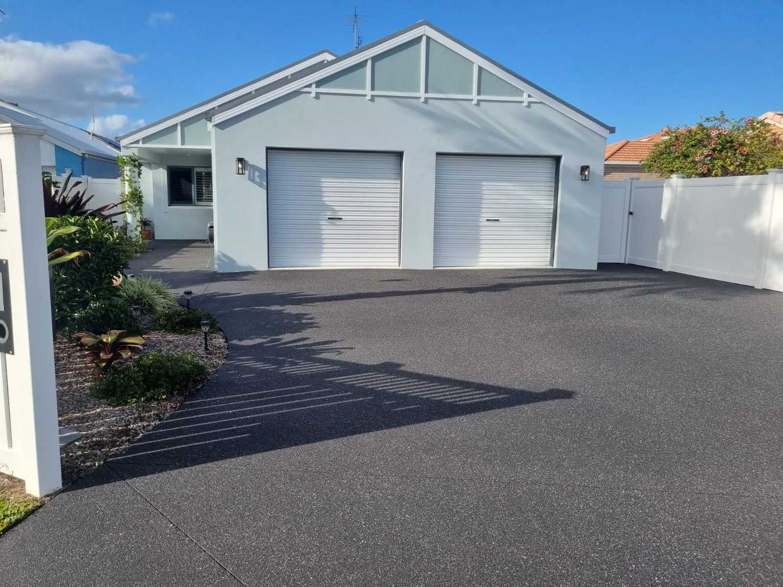 Residential driveway sealed with a UV-stable epoxy coating