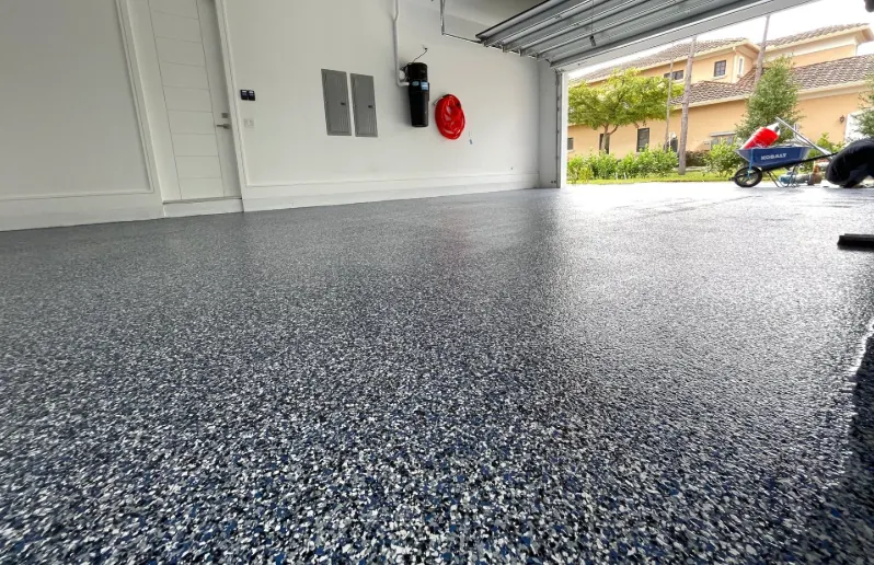 Seamless decorative flake epoxy floor in a residential garage