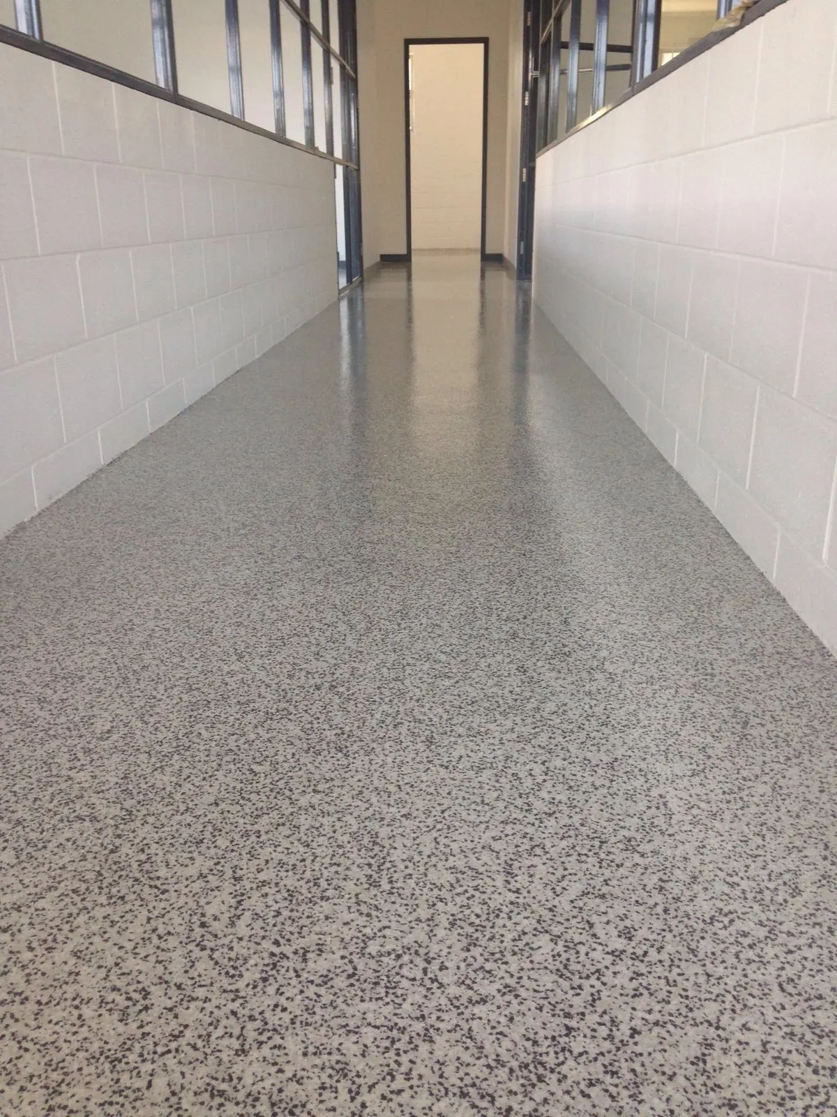 Polished concrete corridor in an institutional building
