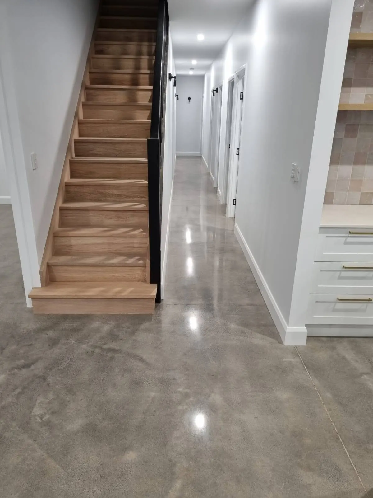 Polished concrete hallway and staircase