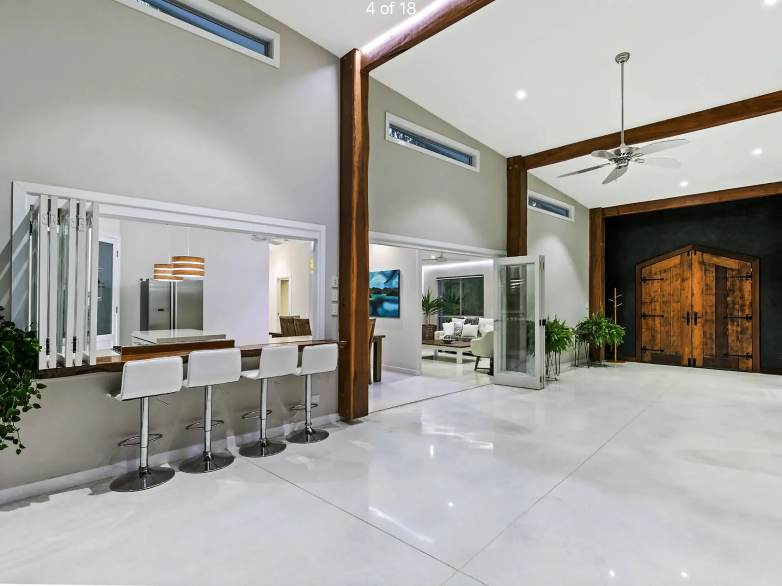 White polished concrete floor through a luxury home
