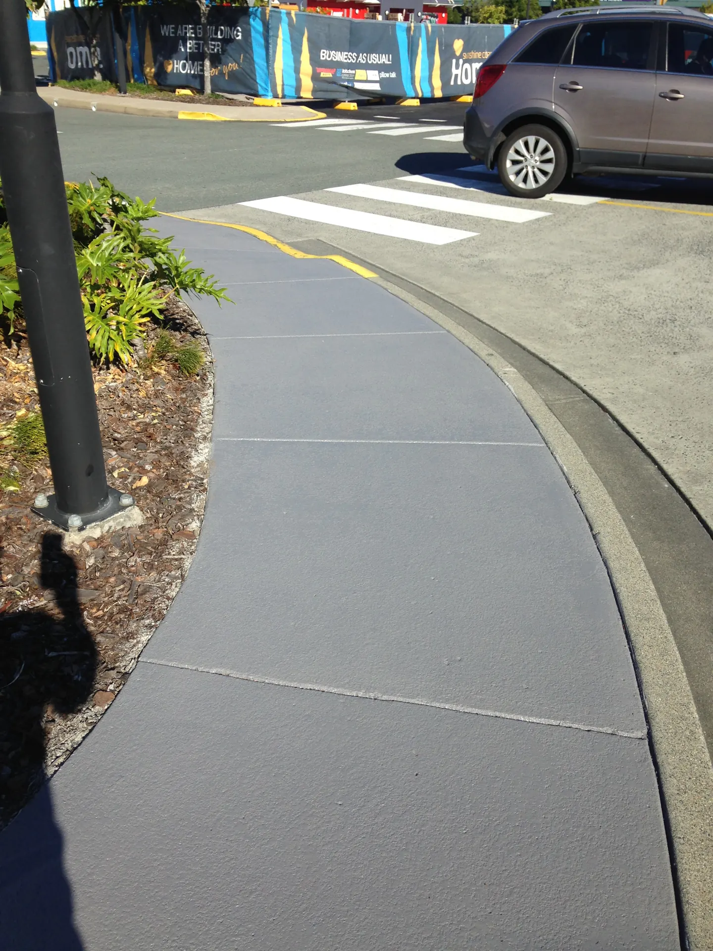 Concrete footpath finish outside a commercial building