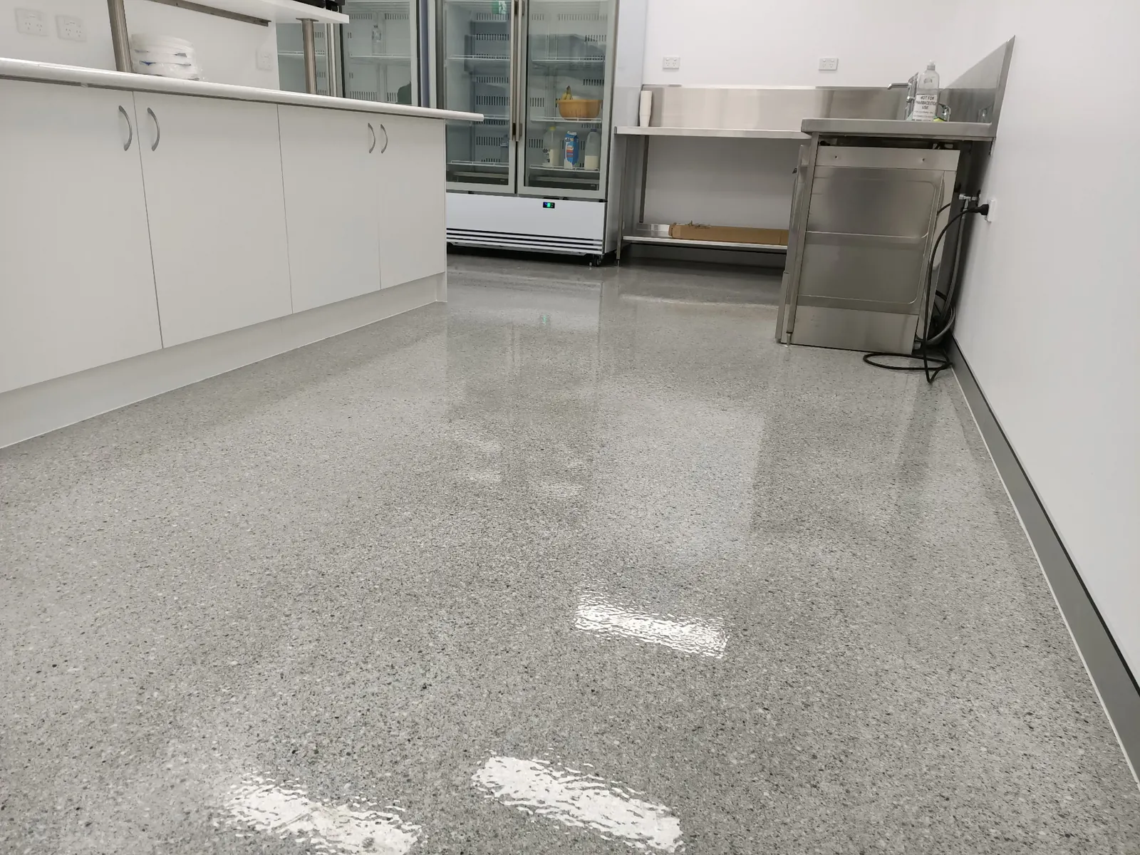 Polished concrete floor in a commercial kitchen