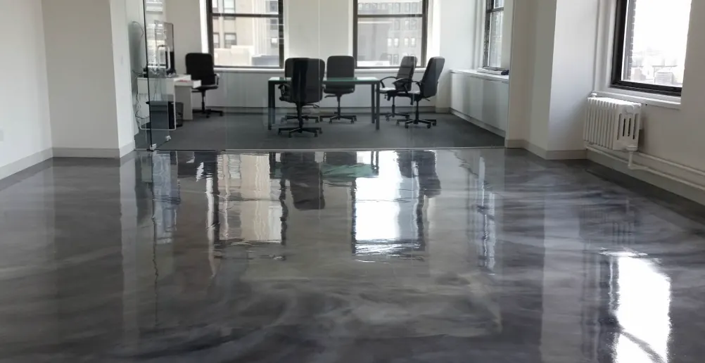 Designer metallic epoxy floor with a swirled gloss finish